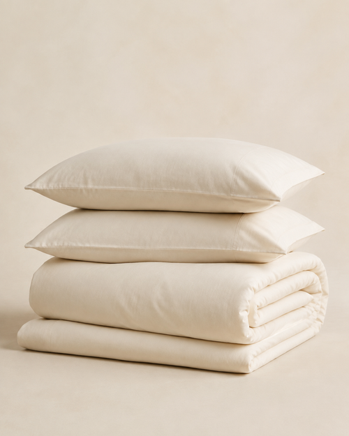 Linge de lit ZAKIRO 100 % coton ivoire plié en studio