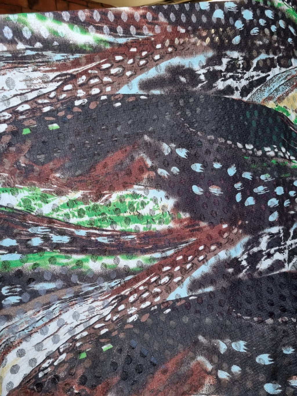 Photo réelle de la dentelle à motifs abstraits multicolores noir marron bleu clair et vert
